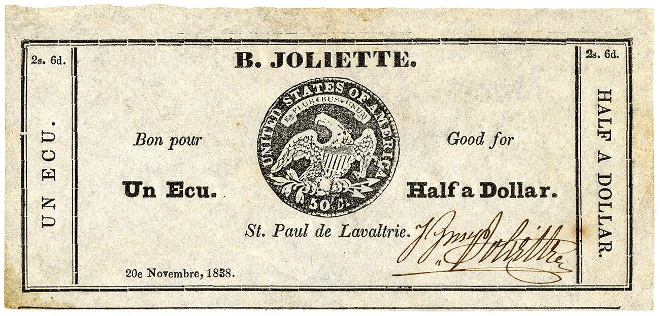 Paper money, block lettering, stamp resembling an American 50-cent coin.