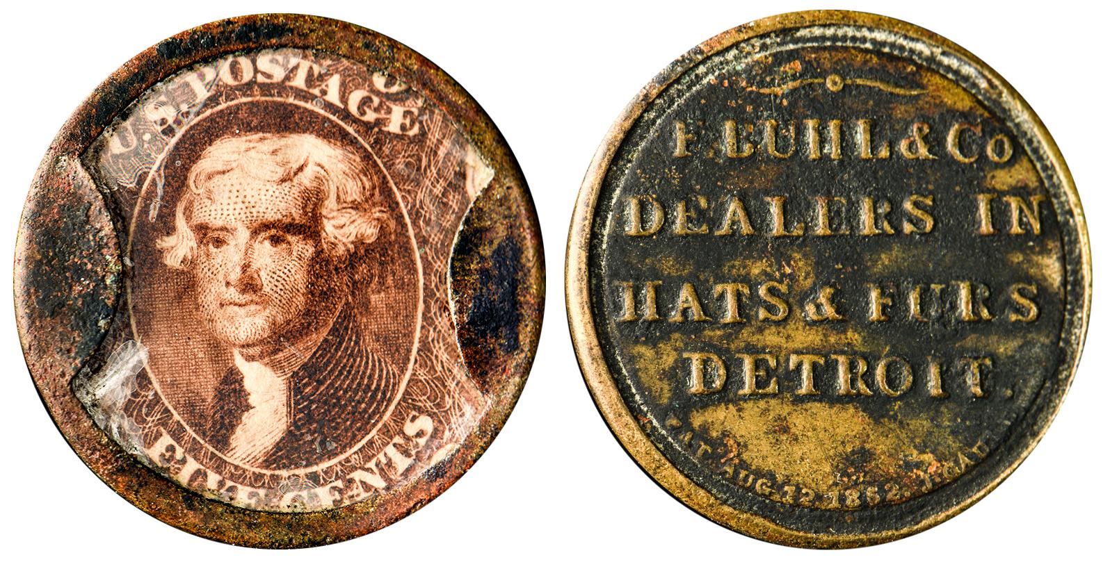 Circular copper case holding a stamp with image of man in a tall-collared coat.